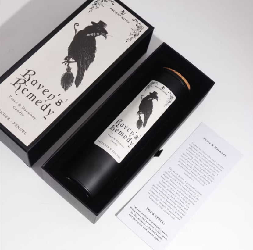 Candle labeled 'Raven's Remedy' in a black box with a white background