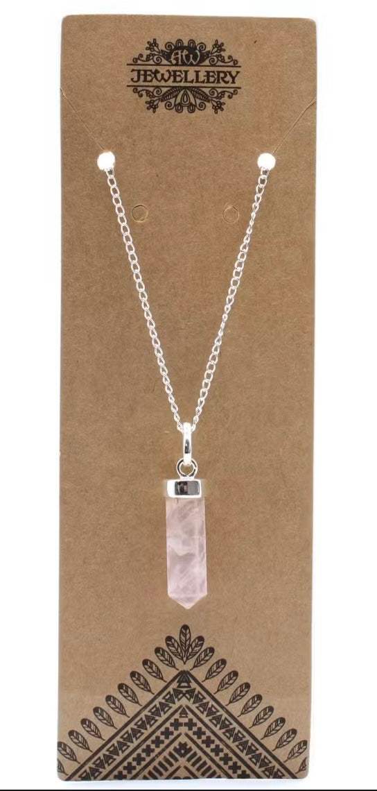 pendant on a chain with rose quartz crystal