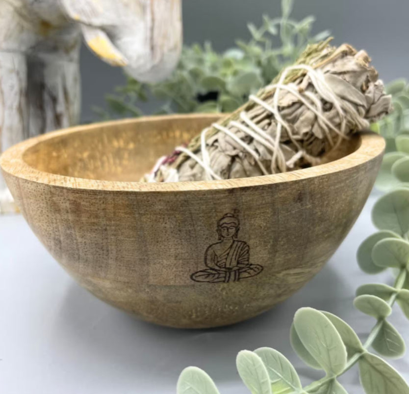 Handcrafted wooden ritual bowl featuring a Buddha design, ideal for smudging and spiritual offerings