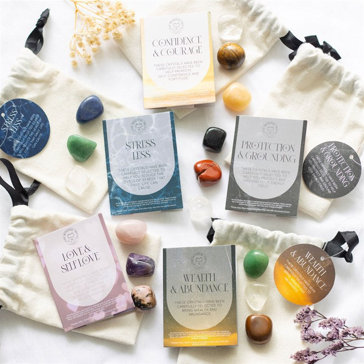 there are five sets of smooth tumbled crystals to collect. confidence and courage, stress less, protection and grounding, wealth and abundance, love and self love. these all come with cotton pouches to keep your crystals safe.