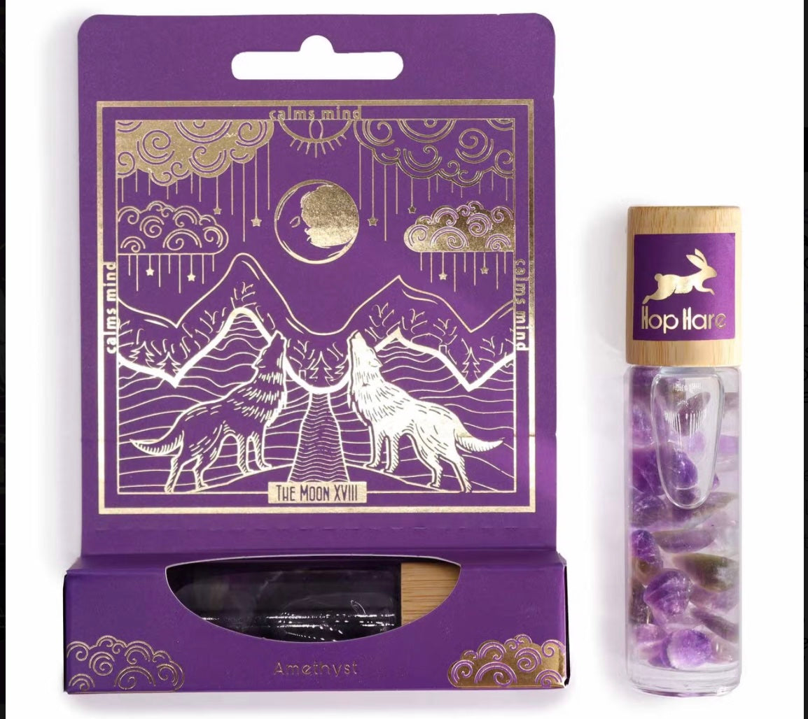 Applying The Moon Amethyst roll-on to pulse points for relaxation and sleep.