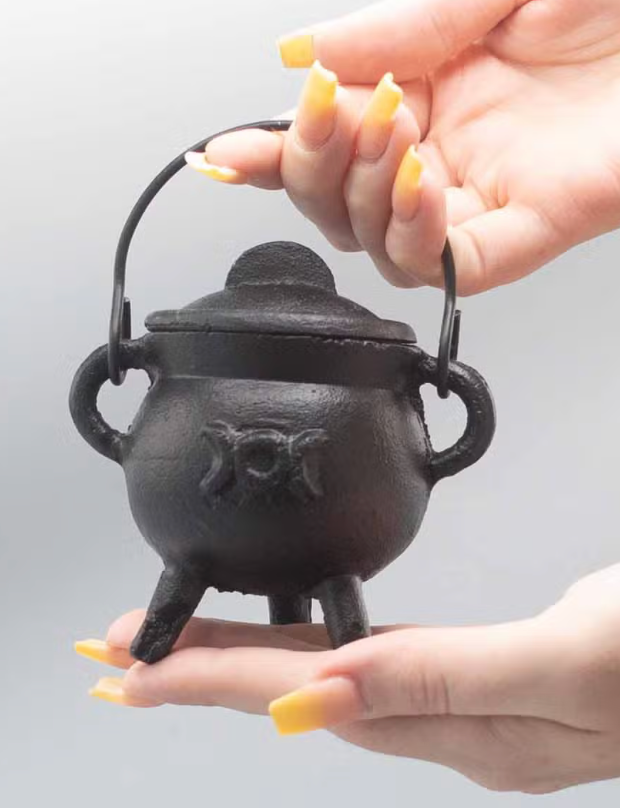 Small black cast iron cauldron to decorate and celebrate Halloween