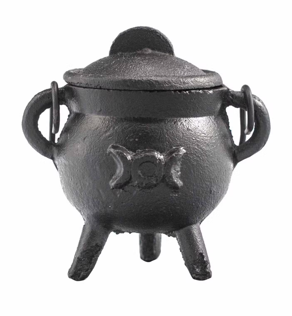 Celebrate Halloween  with this Black cast iron cauldron and lid 
