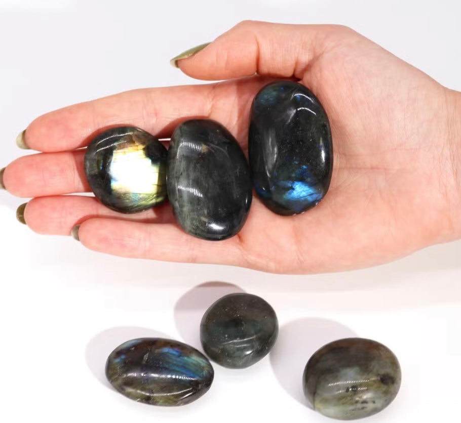 Collection of authentic Madagascar Labradorite crystals showing natural colour variations and mystical flash.