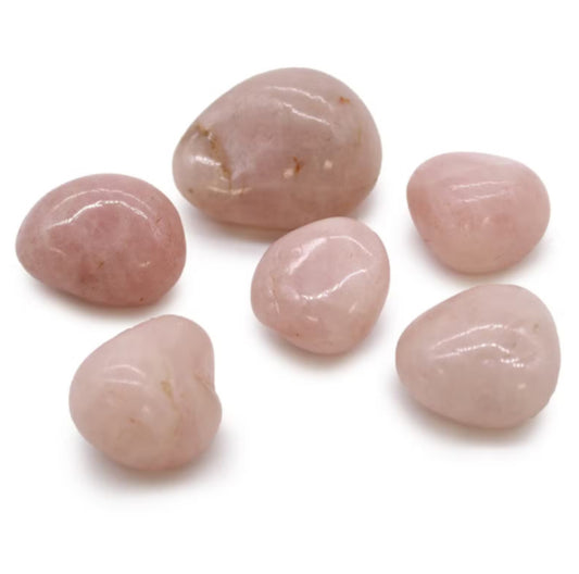 Large tumbled African Rose Quartz stones with soft pink hues for love and heart chakra healing