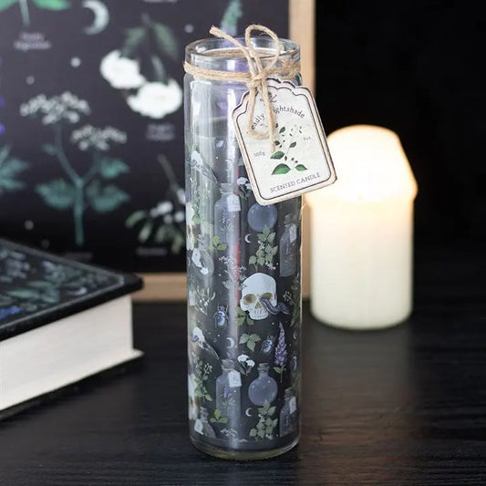 Gothic style candle, with skull images, giving a lovely glow to any decor