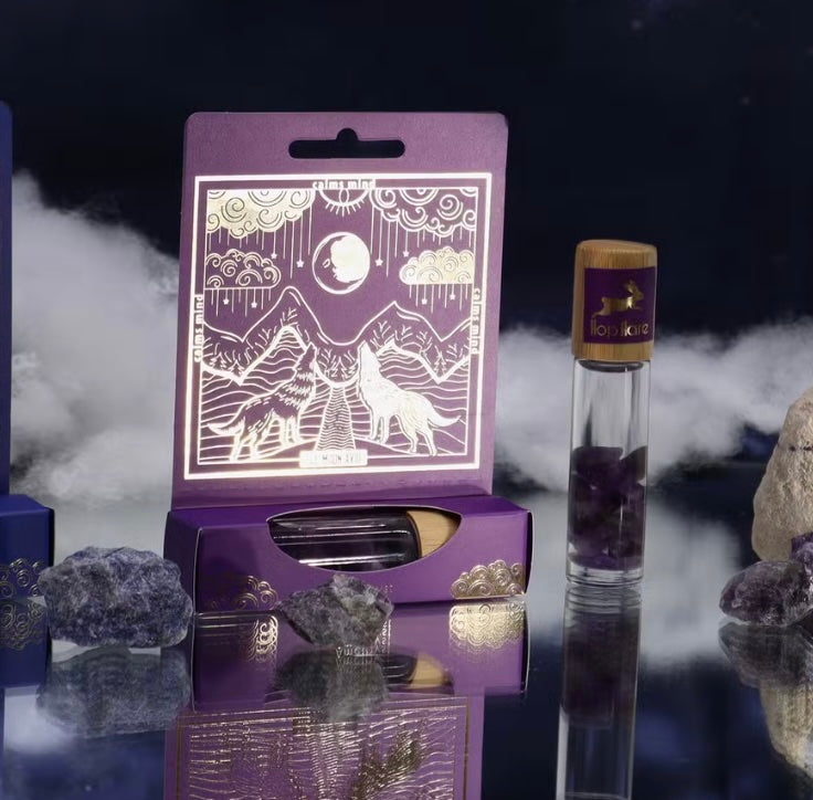 The Moon Tarot roll-on with Amethyst crystal for calming aromatherapy and sleep.