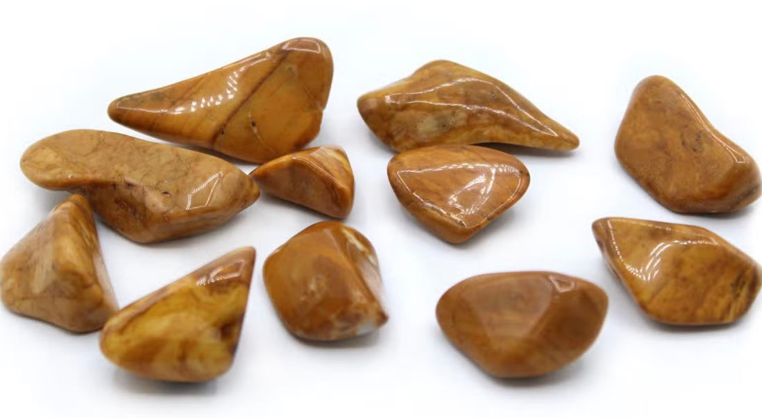 Natural Yellow Jasper gemstones for Solar Plexus Chakra healing, authentic crystals with golden yellow hues and natural patterns.