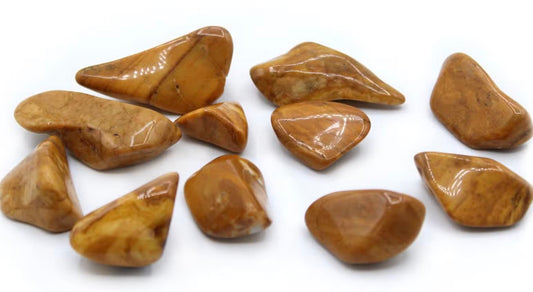 Natural Yellow Jasper gemstones for Solar Plexus Chakra healing, authentic crystals with golden yellow hues and natural patterns.