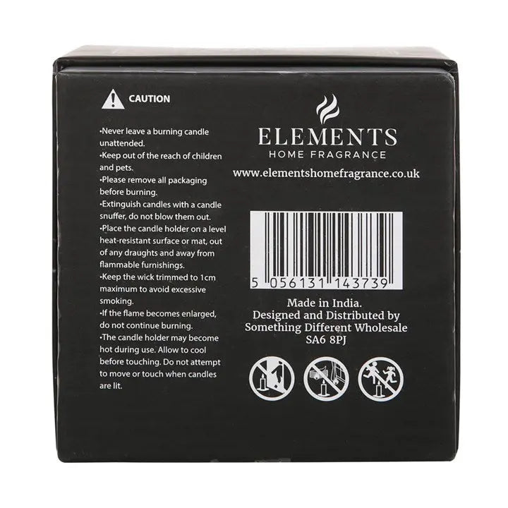 Back of a candle packaging with text, barcode, and caution symbols on a black background