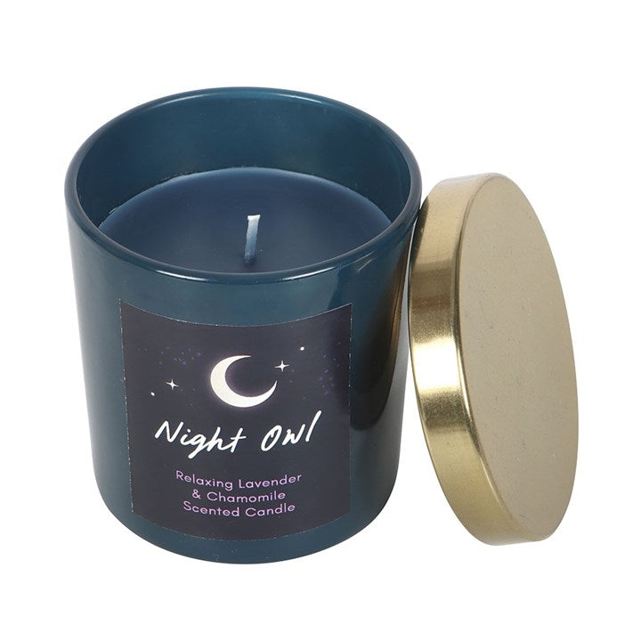 Scented candle labeled 'Night Owl' with a gold lid on a white background