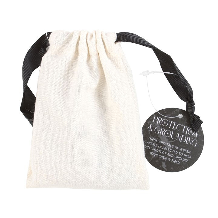 white cloth cotton drawstring bag to use to keep crystals clean and safe.