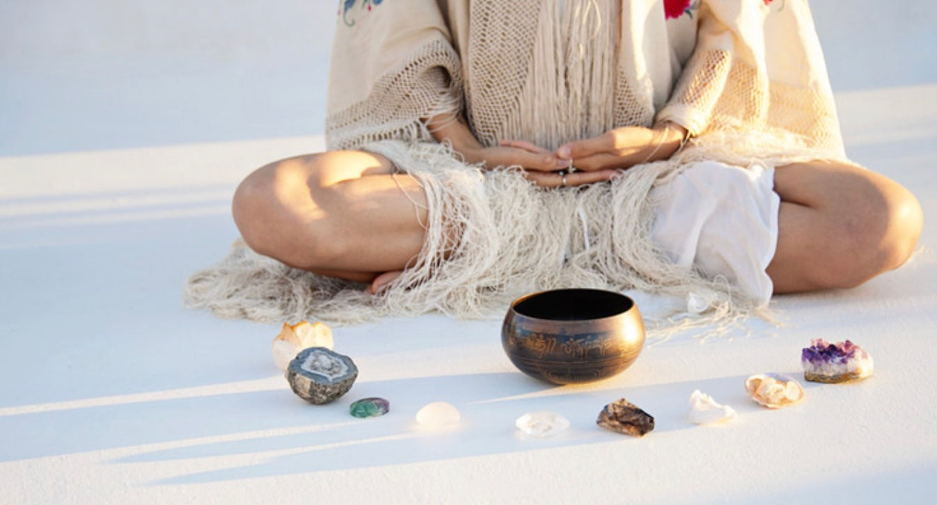 singing bowl and crystals use to help with meditation